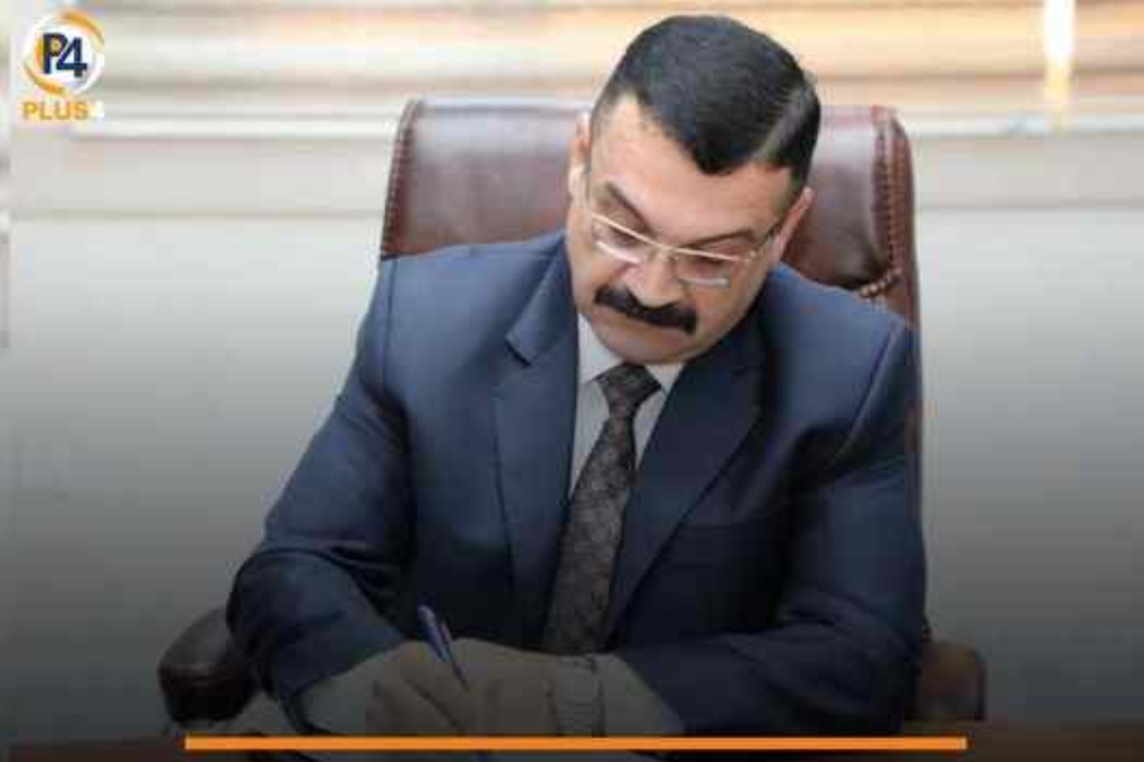 بە